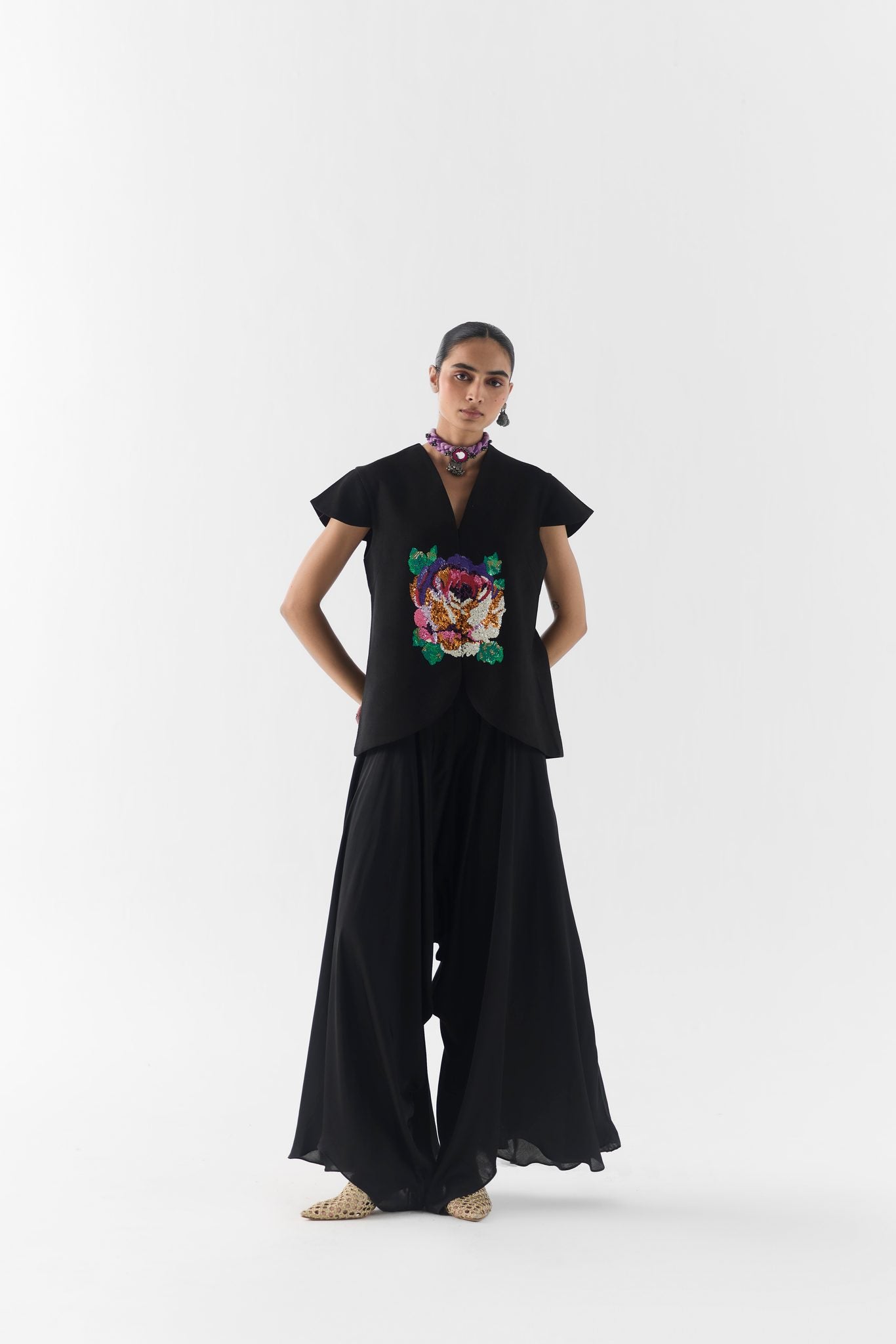 Black Garden Rose Vest and Dhoti Pants front view on model in floral occasion set