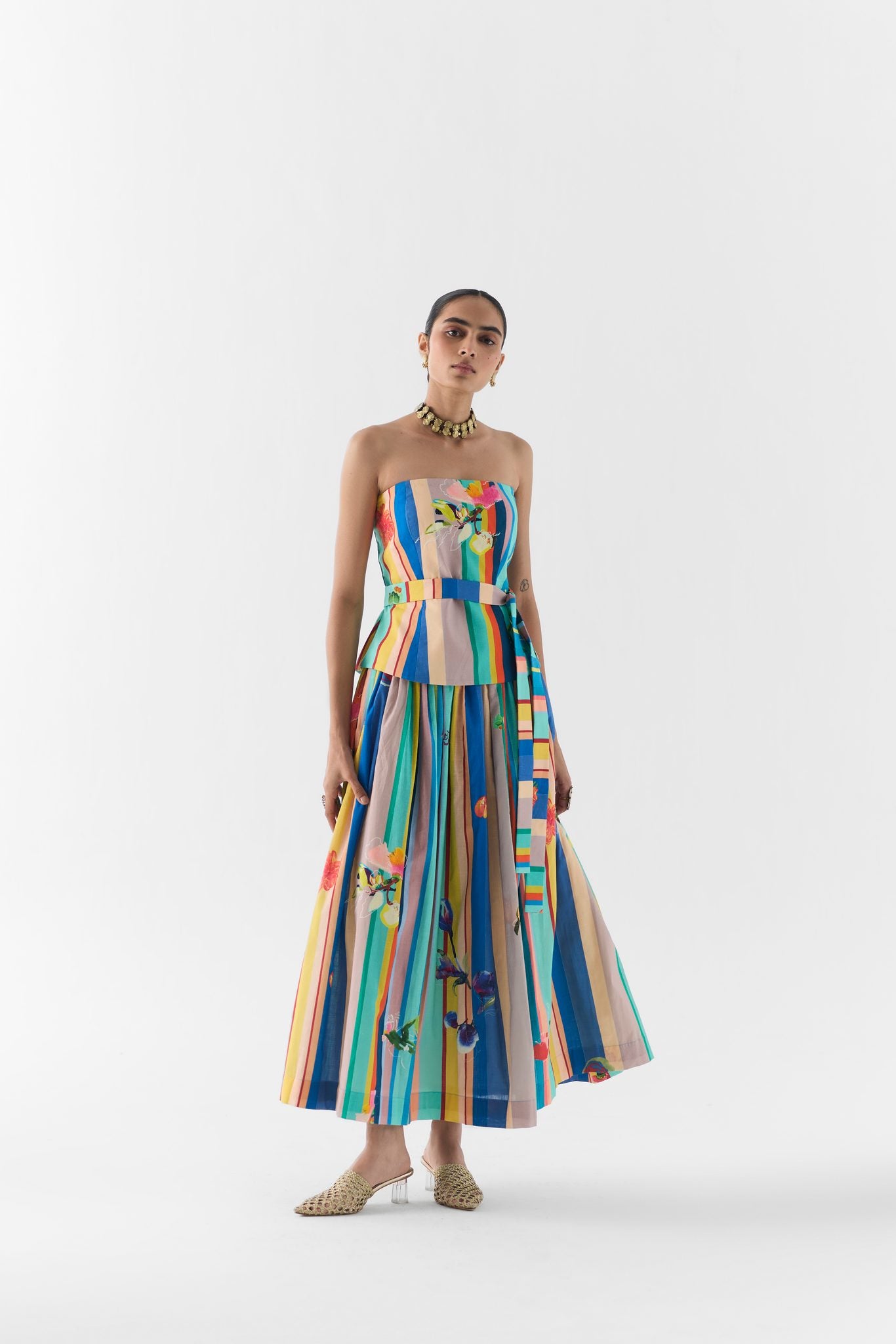 Side view of the Blue Barcode Off Shoulder Top and Skirt showing the fitted skirt drape