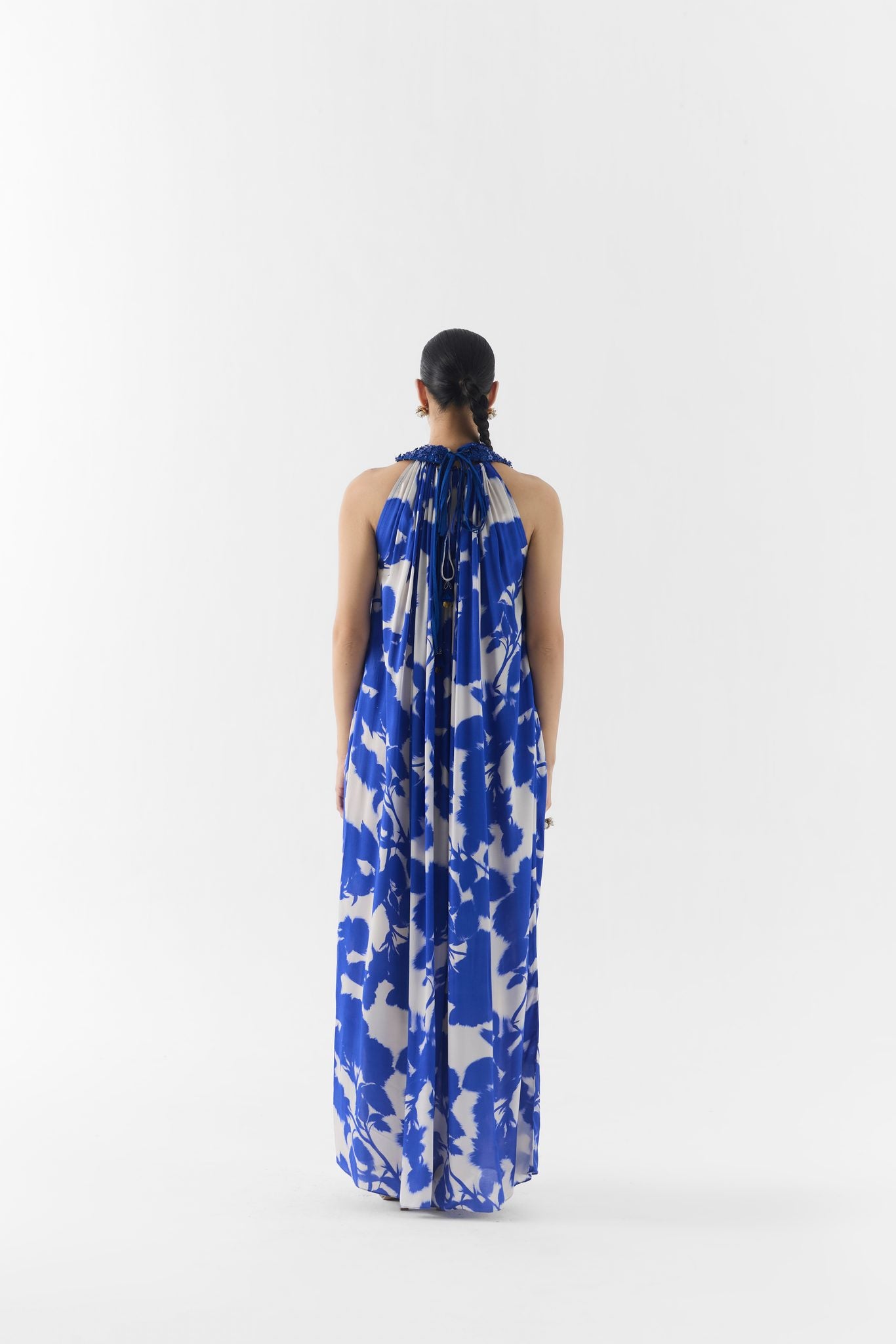 Blue ink print fabric and halter neckline detail on the collared halter dress