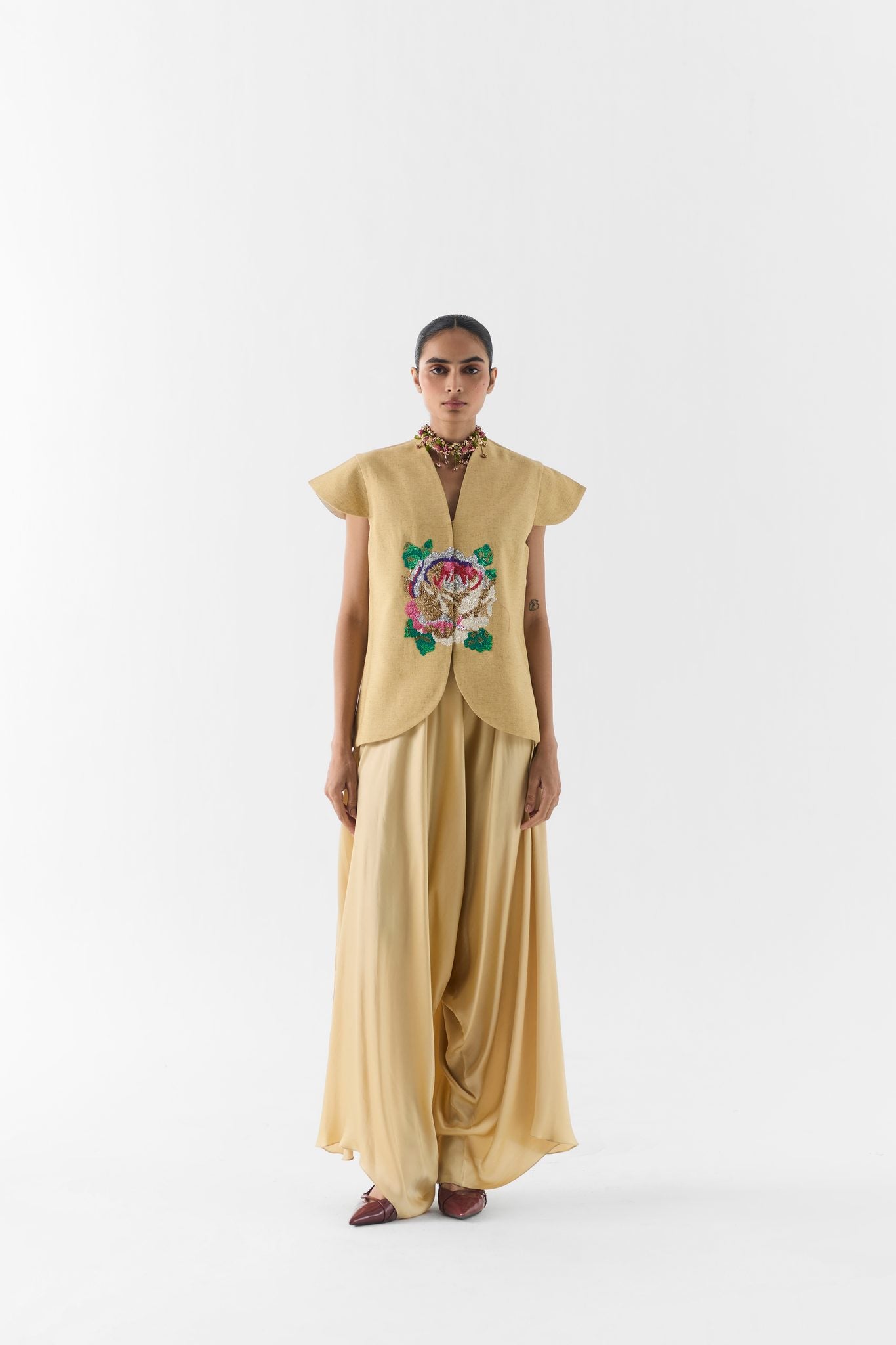 Gold Garden Rose Vest and Dhoti Pants front view on model in festive floral set