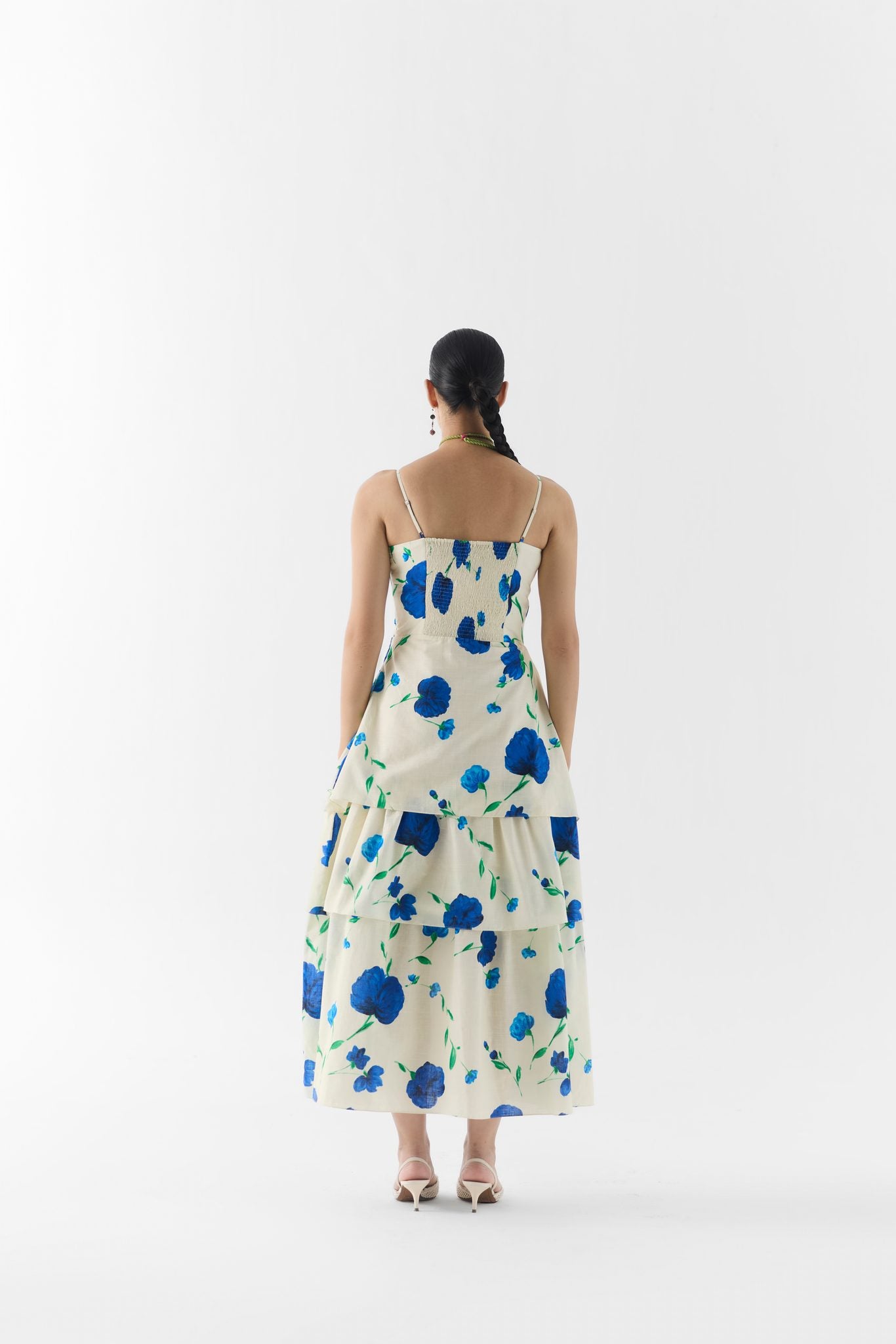 Close-up of the moss rose print and bustier seaming detail