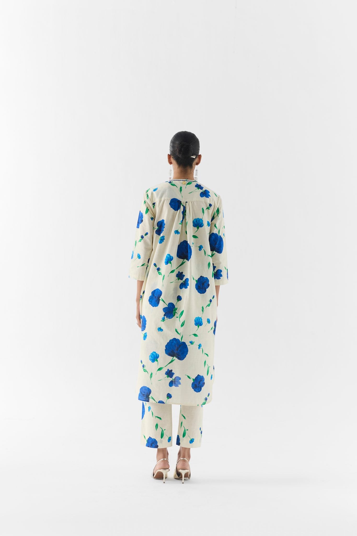 Close-up of the moss rose floral print fabric on the kurta