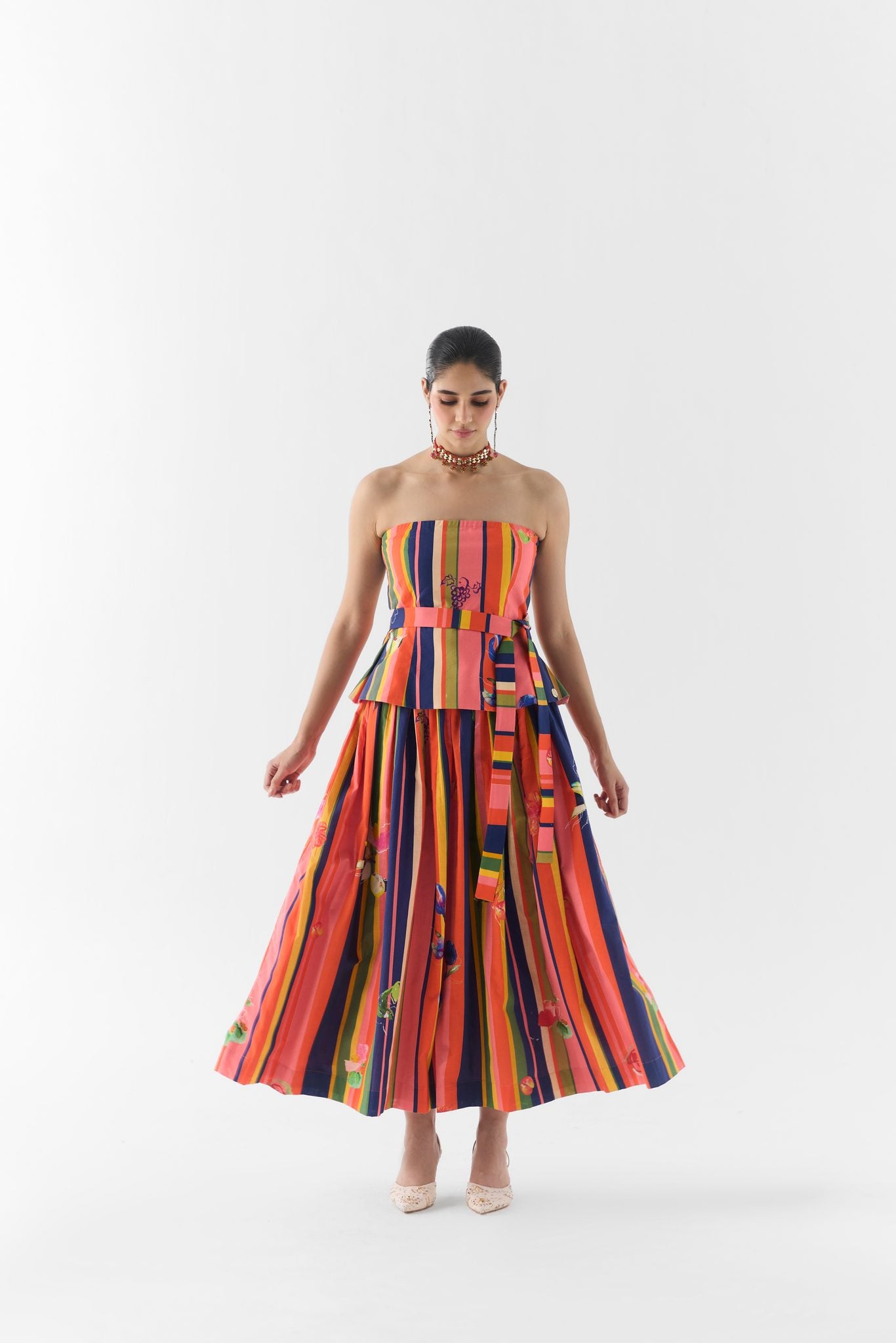 Side profile of the Pink Barcode Off Shoulder Top and Skirt showing skirt silhouette