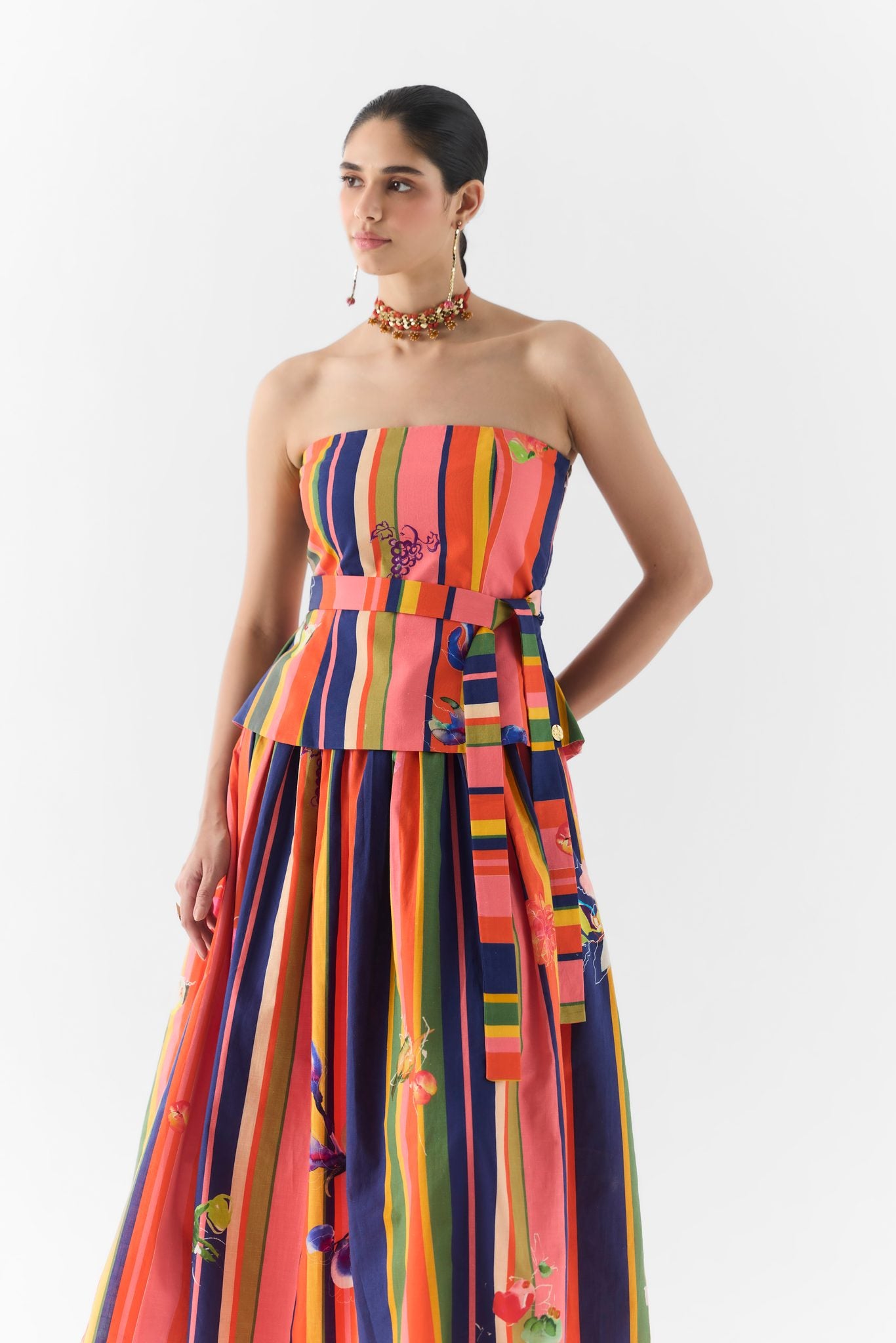 Back view of the Pink Barcode off shoulder top paired with the matching printed skirt
