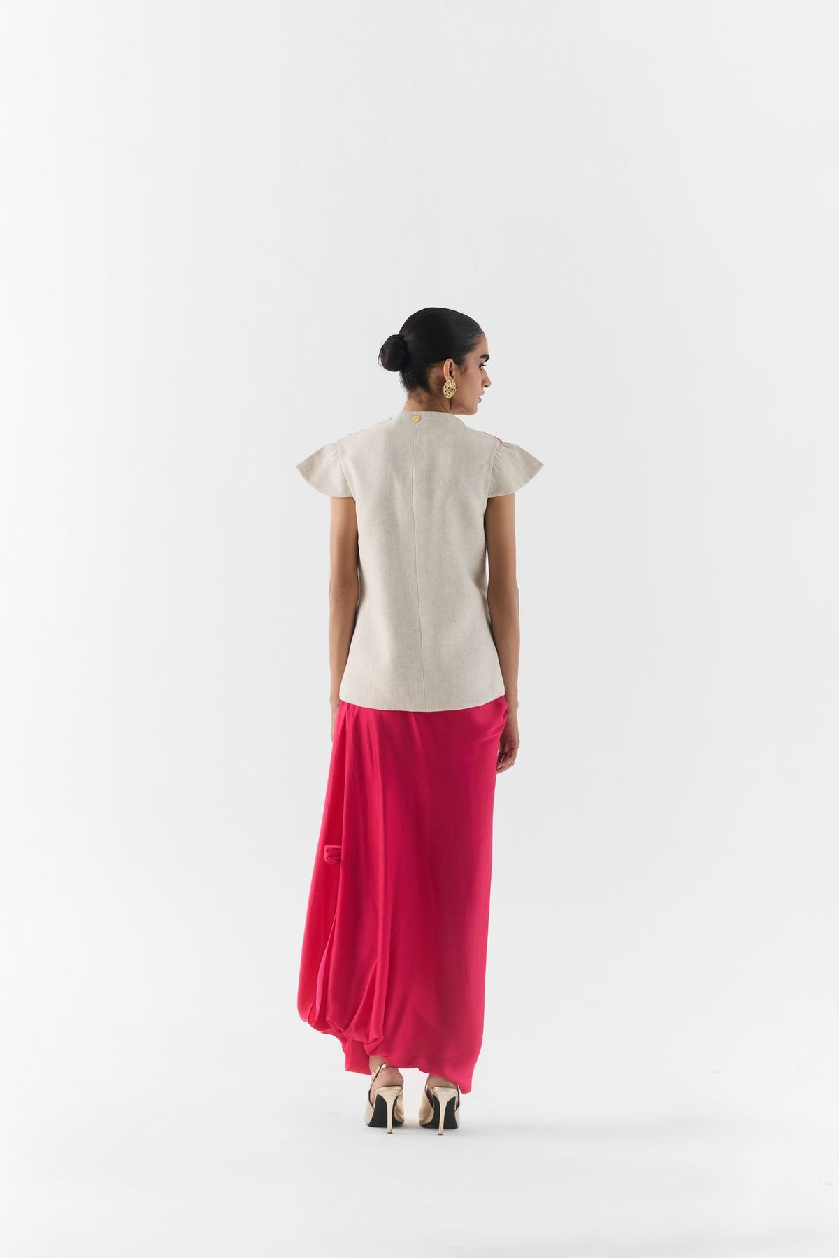Pink rose print fabric and stitching detail on Studiorigu vest and dhoti set