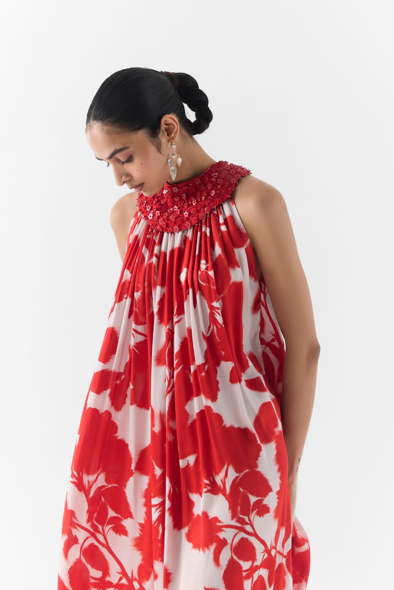 Side view of the Red Ink Halter Dress showing collar and fitted silhouette