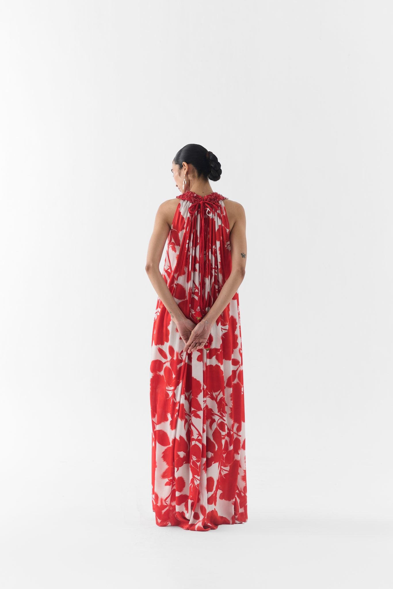 Red ink print fabric and halter neckline detail on the collared halter dress