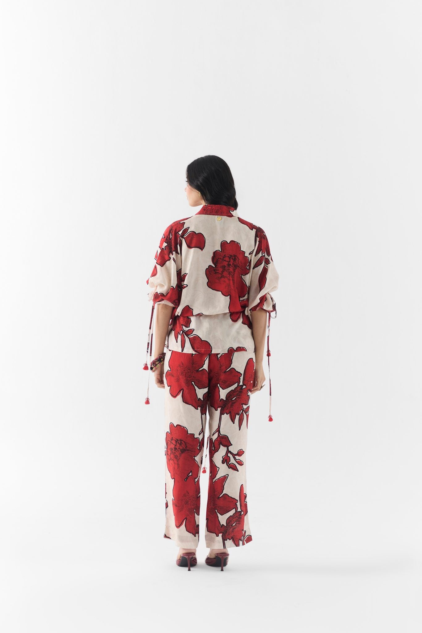 Back view of Rosalie red floral print shirt and wide-leg trousers co-ord