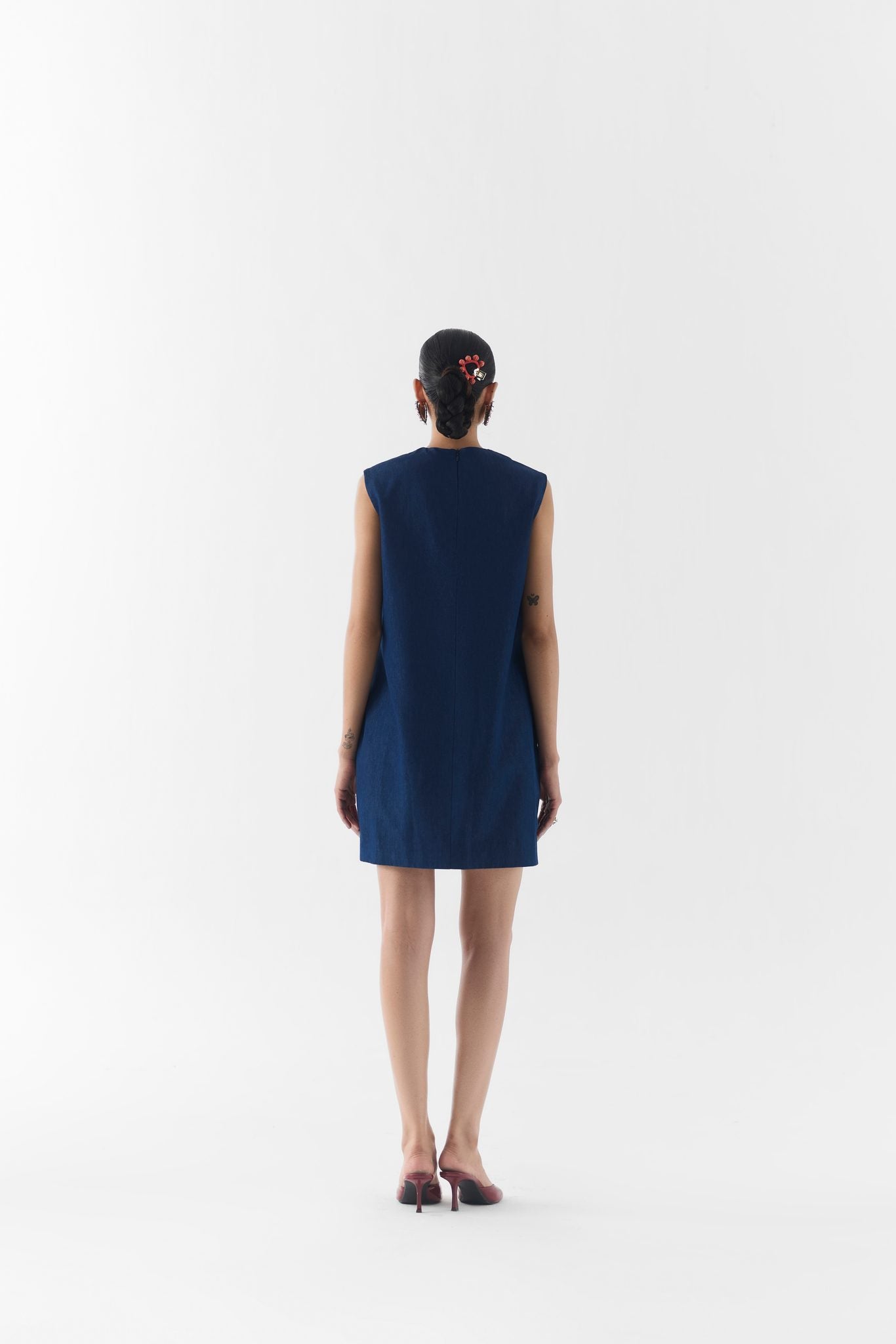 Back view of the Rose Denim Dress in rose print denim fabric