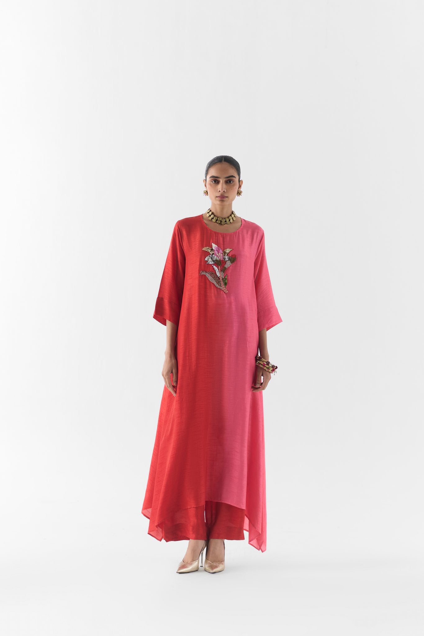 Ruby kurta and pants set, front view on model