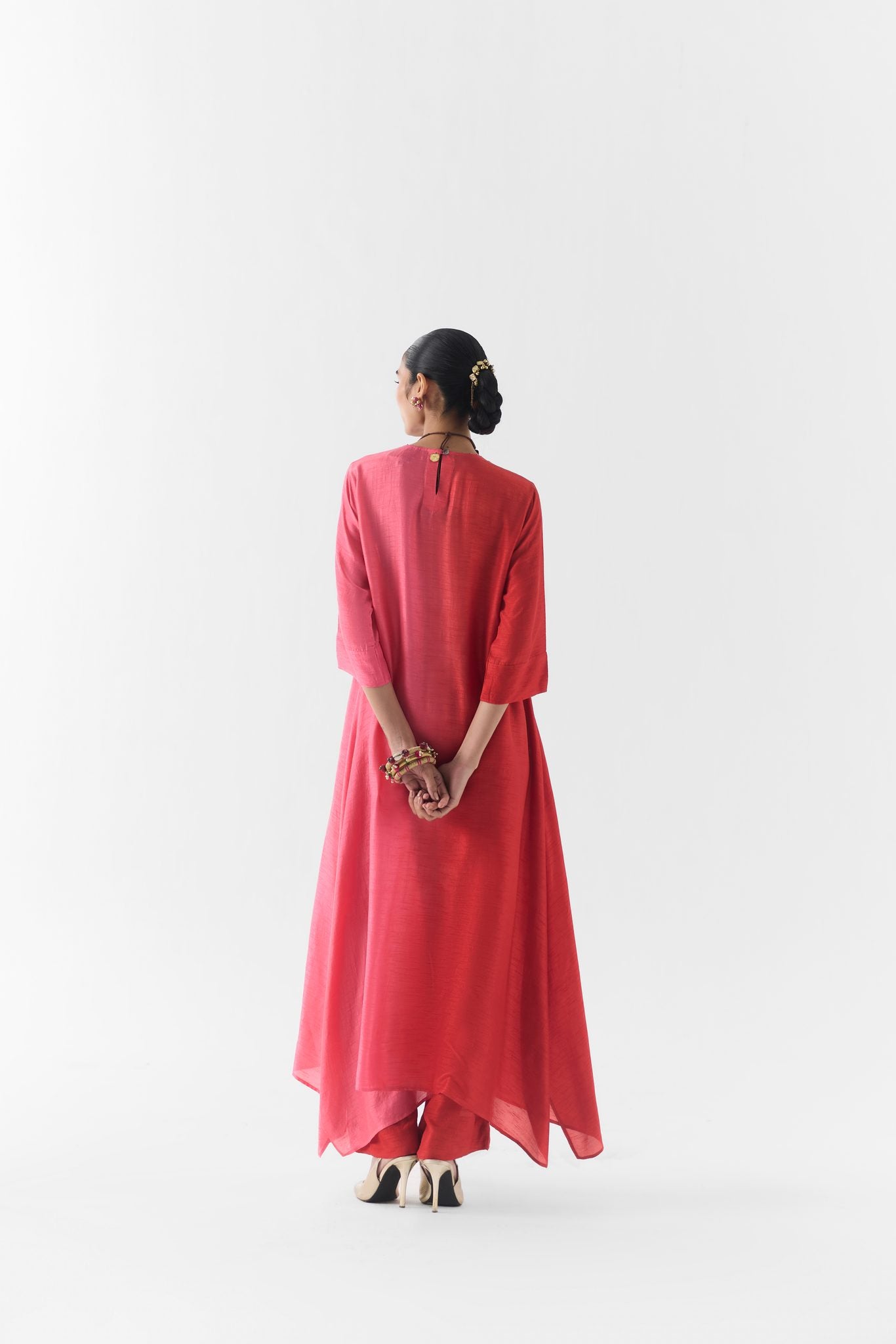 Back view of the Ruby kurta set in rich red tones