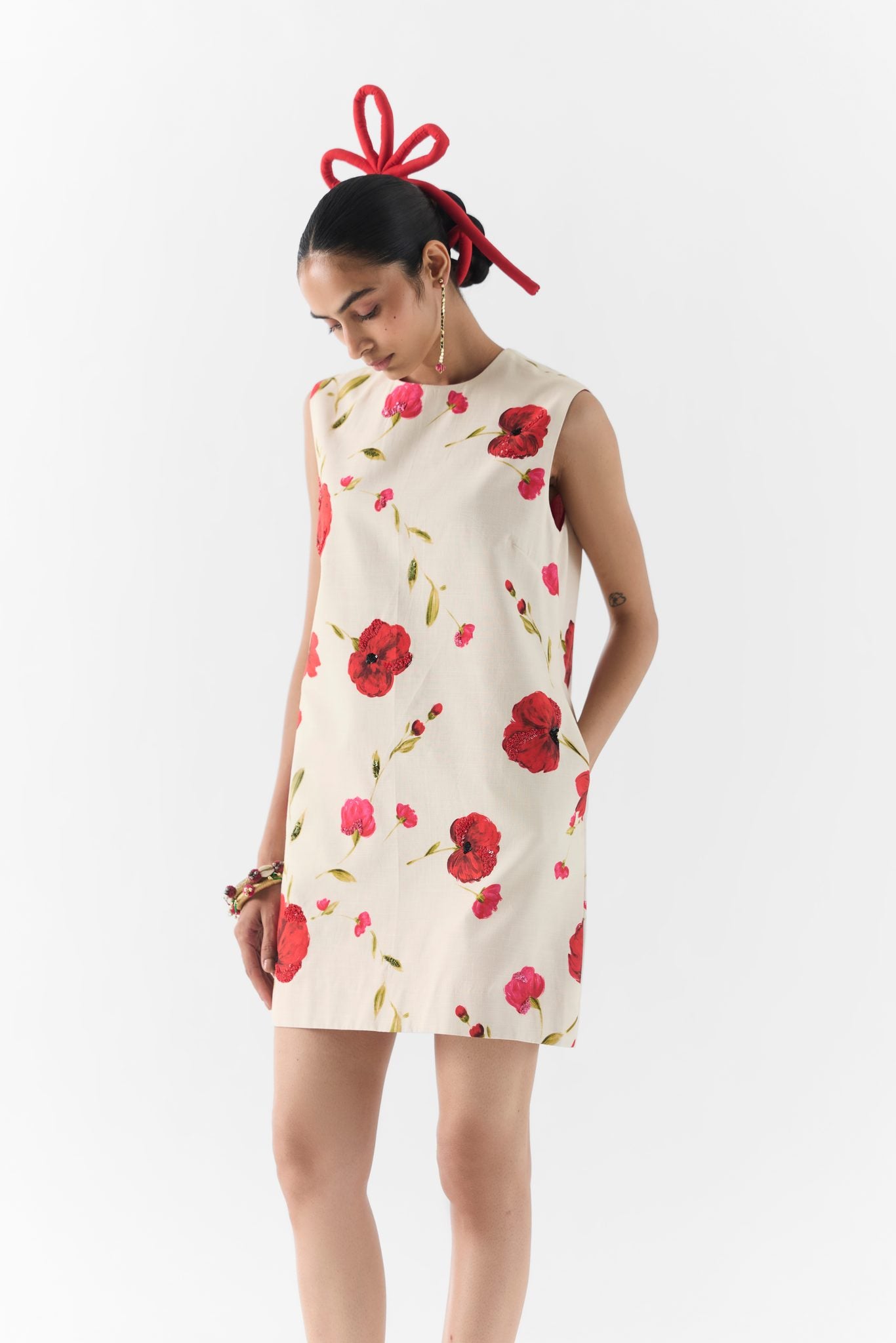 Fabric and rose print detail of the Sisley Rose short dress