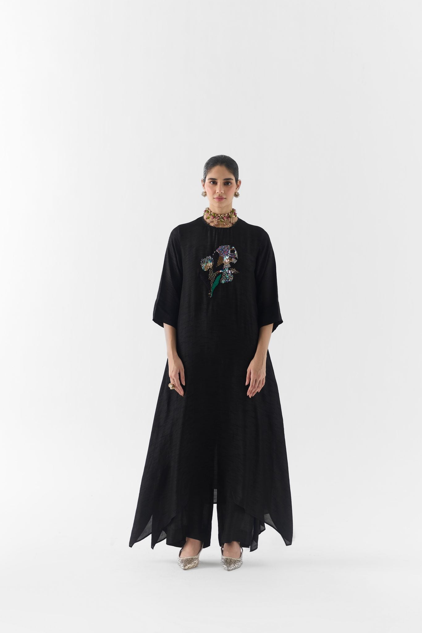 Black Rose kurta and pants set, front view on model