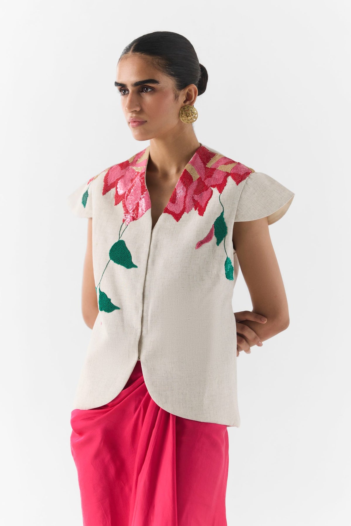 Side view of Pink Rose dhoti pants showing drape and vest silhouette