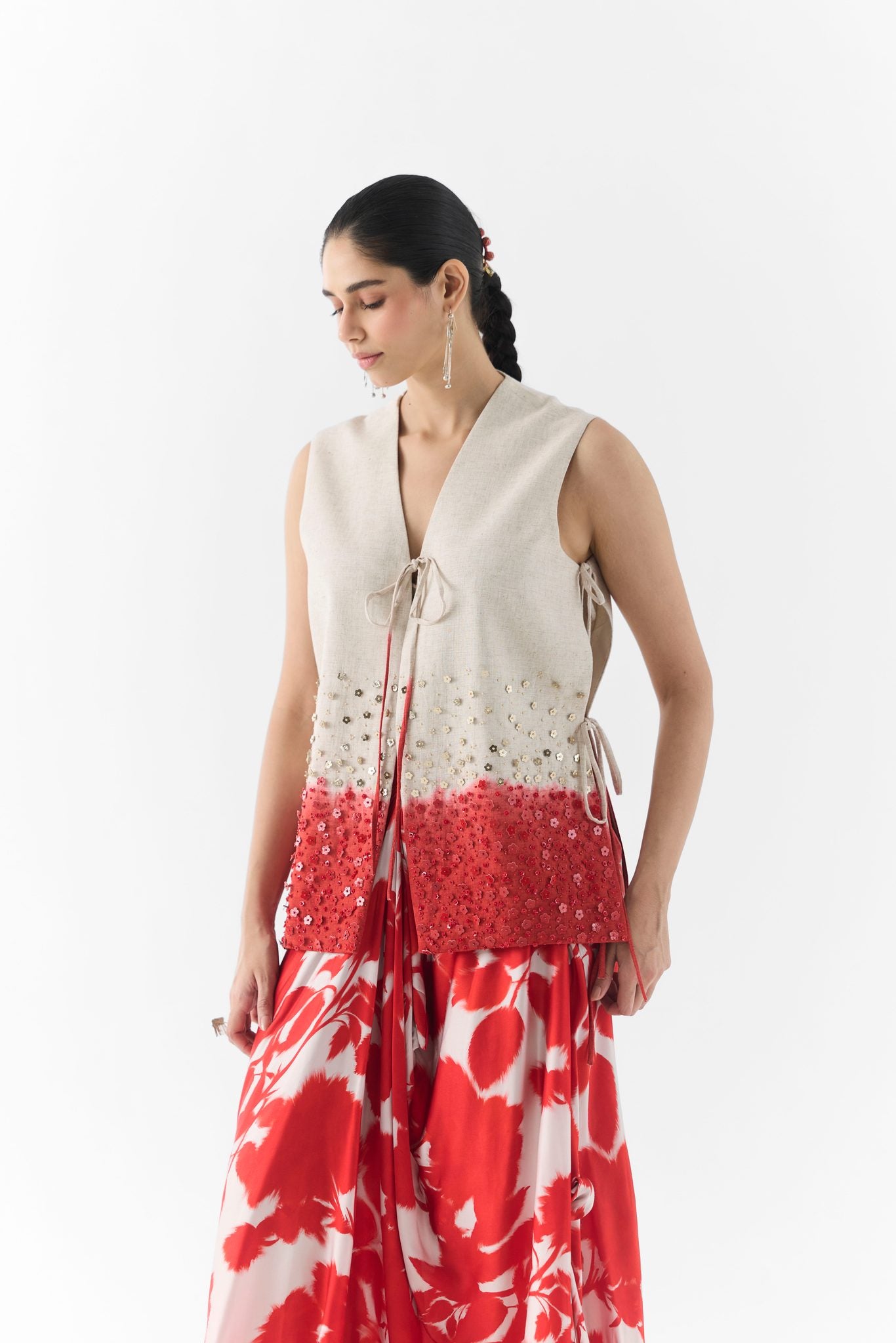 Side view of Red Ink dhoti pants showing draped pleats and tailored vest